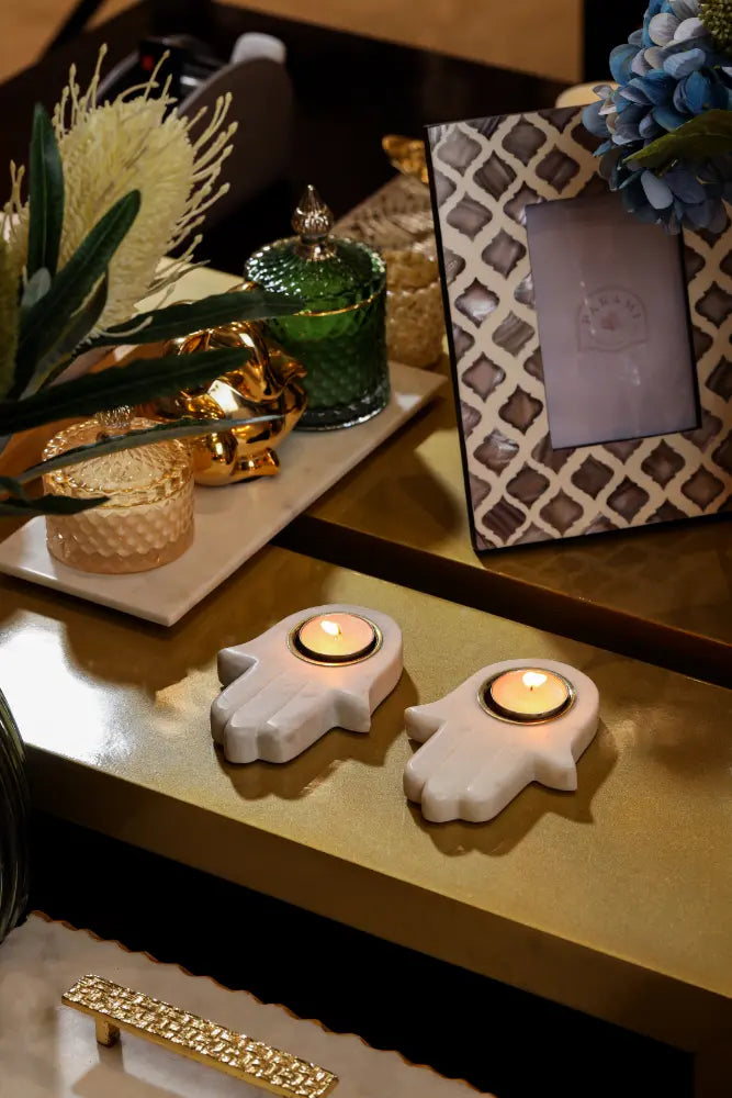 Parami marble tealight holder with palm design styled in an elegant home decor setup