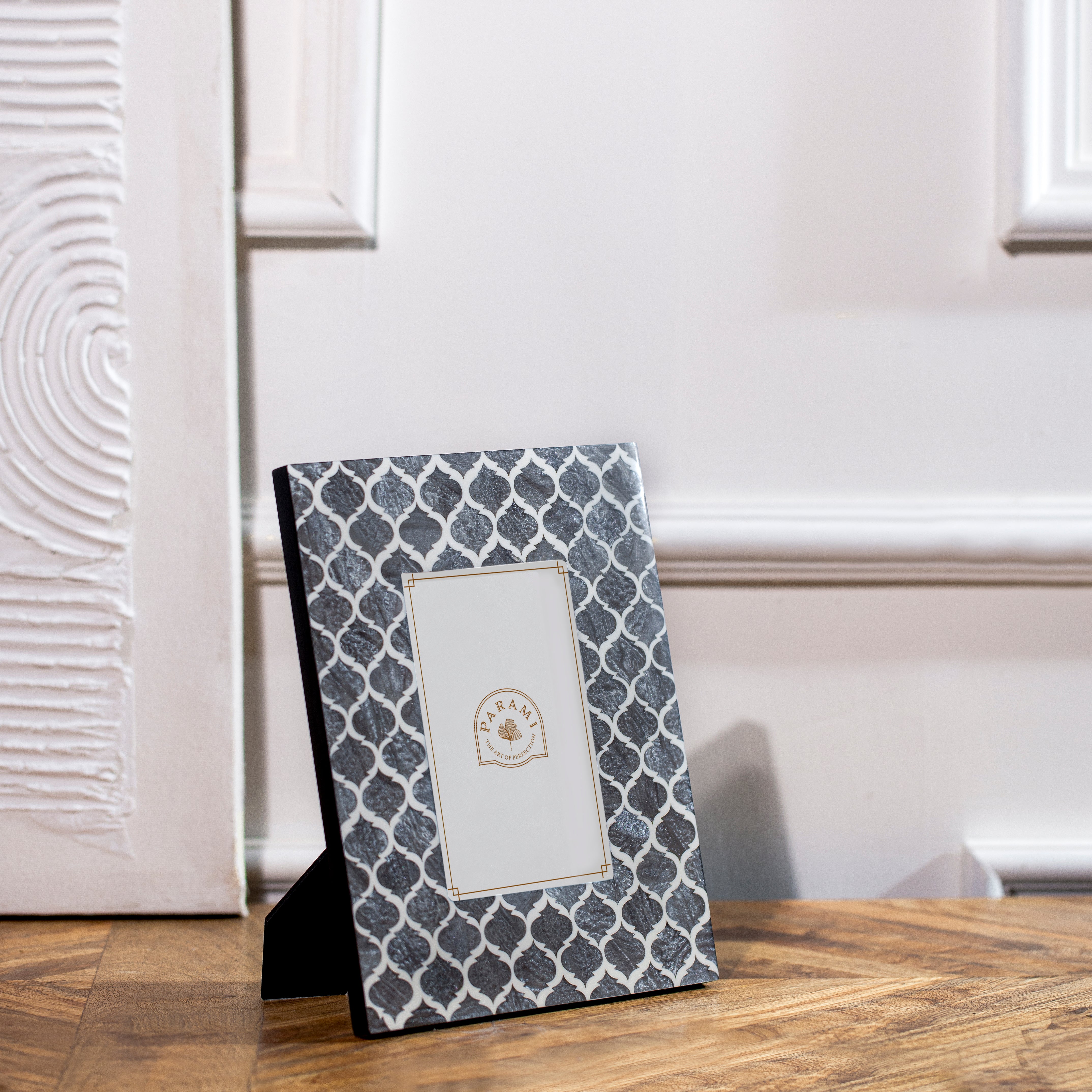 Side angle view of Parami grey resin decorative photo frames with geometric pattern