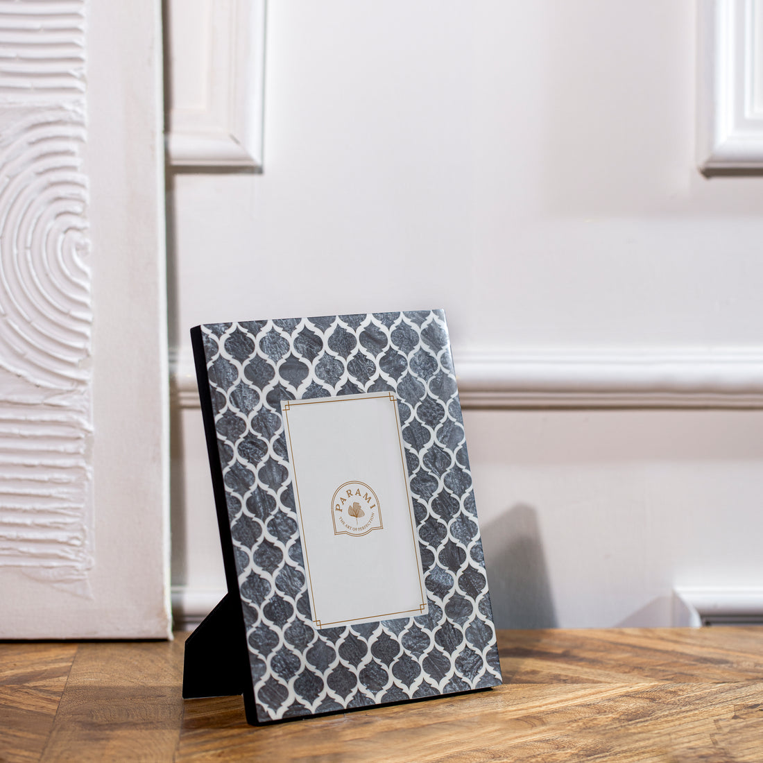 Side angle view of Parami grey resin decorative photo frames with geometric pattern