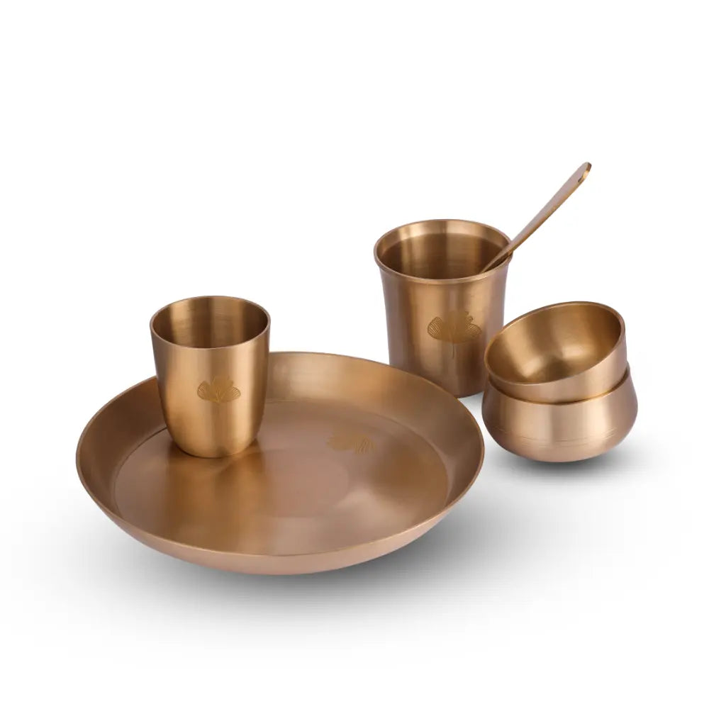 Kansa Utensils Kansa Short Glass showcased with matching kansa diningware by Parami