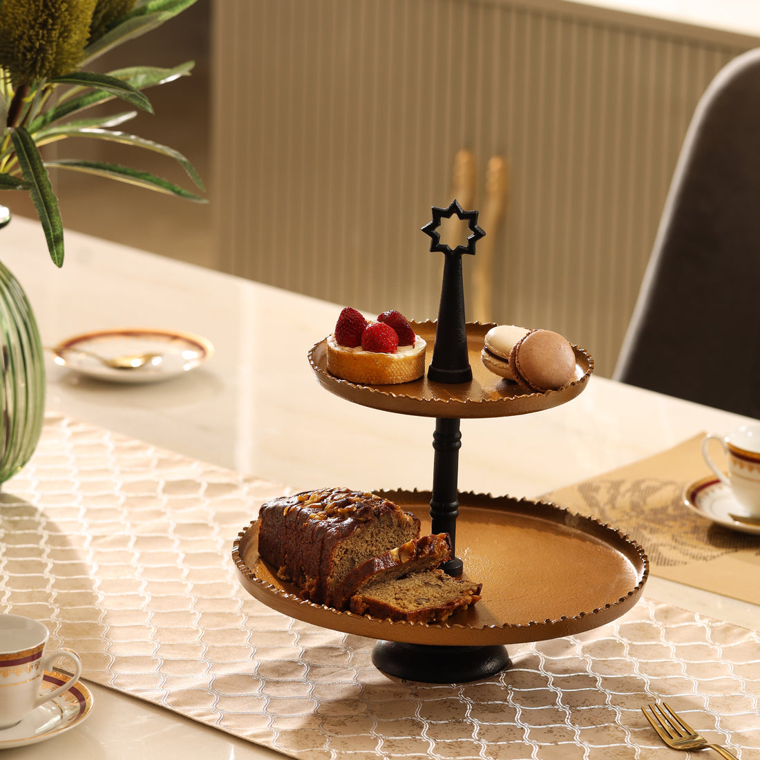Parami two tier cake display stand styled as an elegant cake stands with desserts on a dining table
