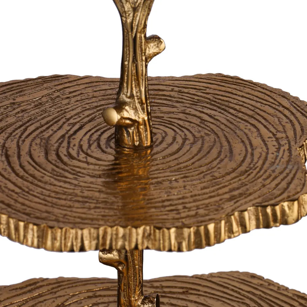 Decorative cake stands close-up view with rustic gold design Parami