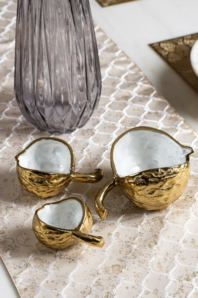 Gold serving bowl set with shell design for table decor by Parami