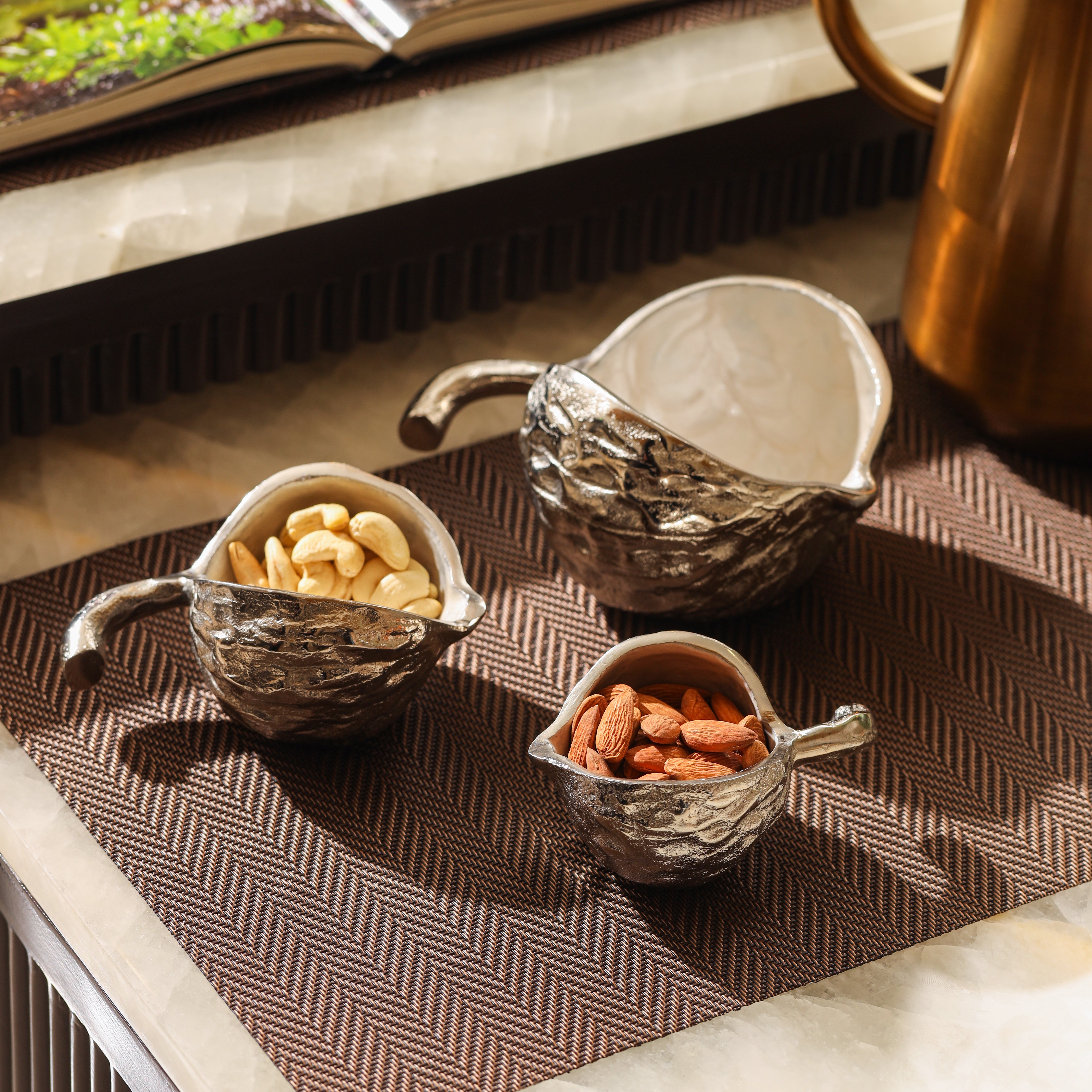 Silver serving bowl set for elegant table decor by Parami